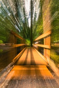 zoom across the wooden bridge