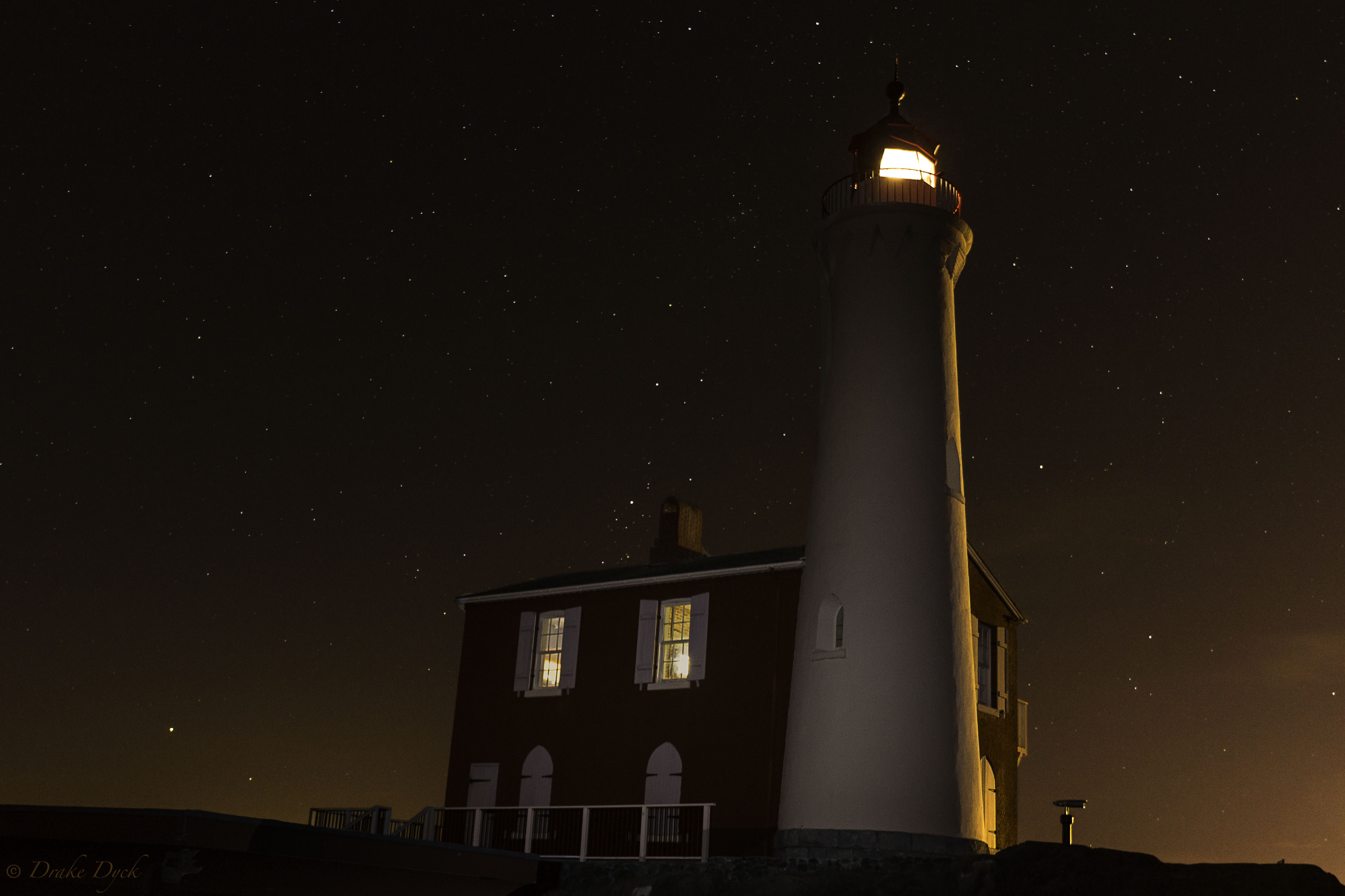 Fisgard Lighthouse after dark with stars in the sky