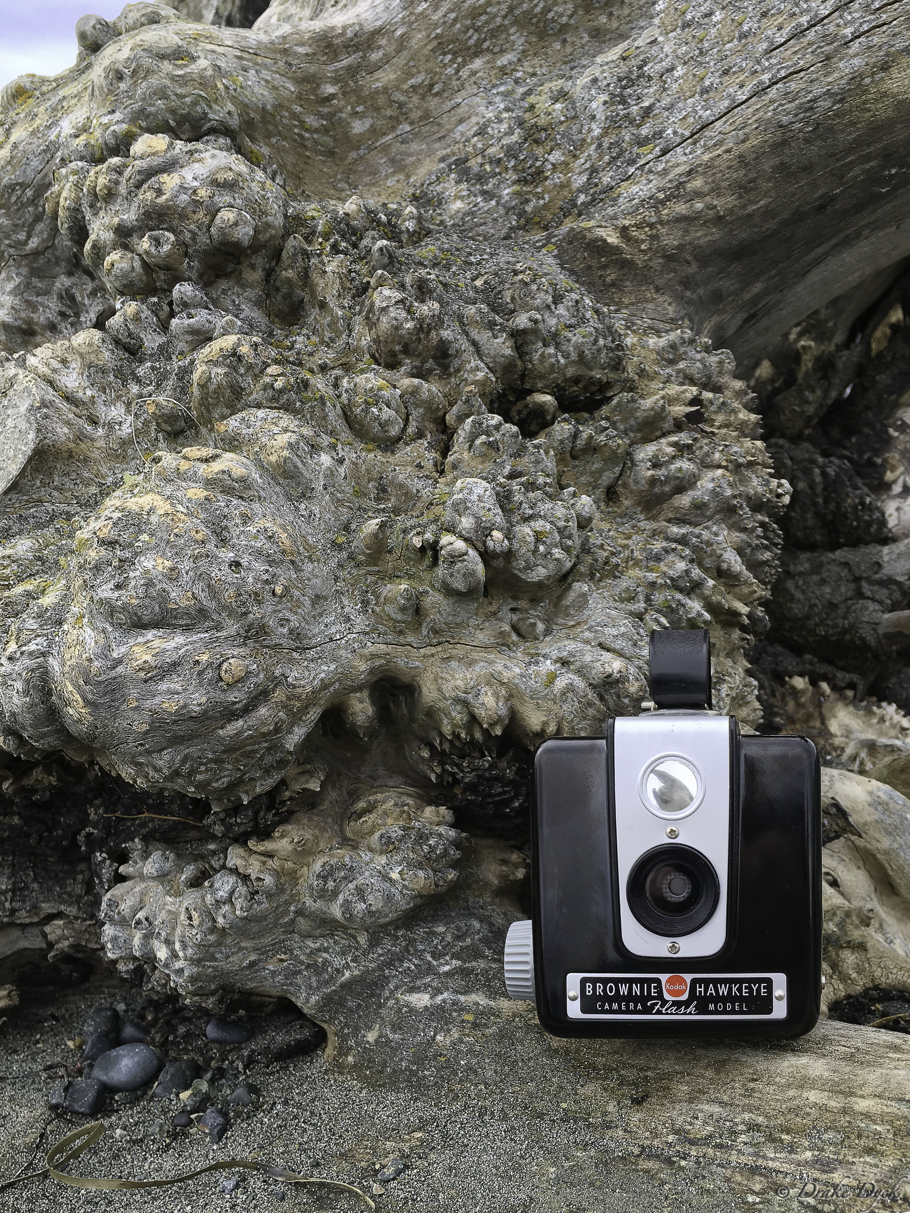 old film camera on the beach