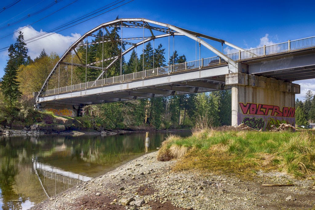 bridge reflecting on the river