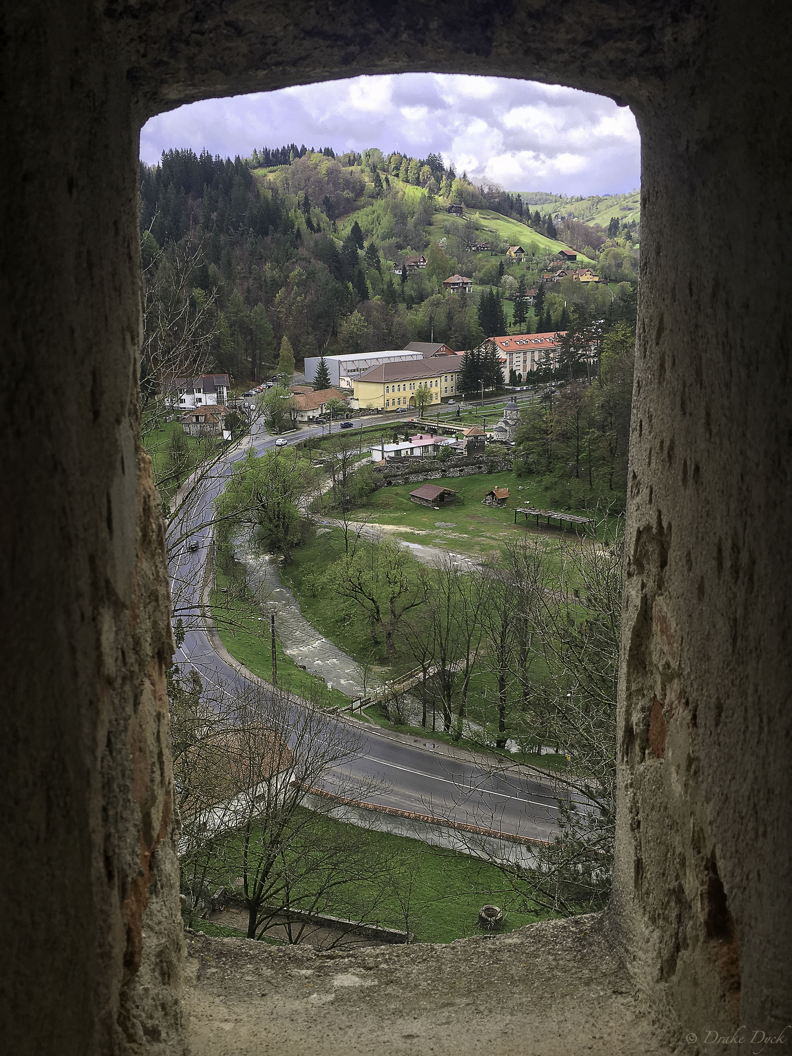 the view of modern roads from an ancient castle