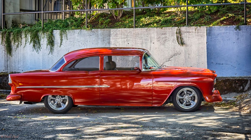 bright orange Chevrolet classic car