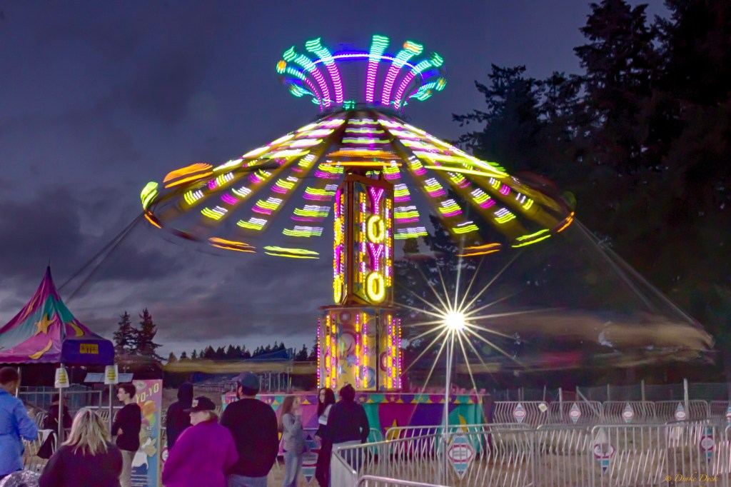 ride at the fall fair spins