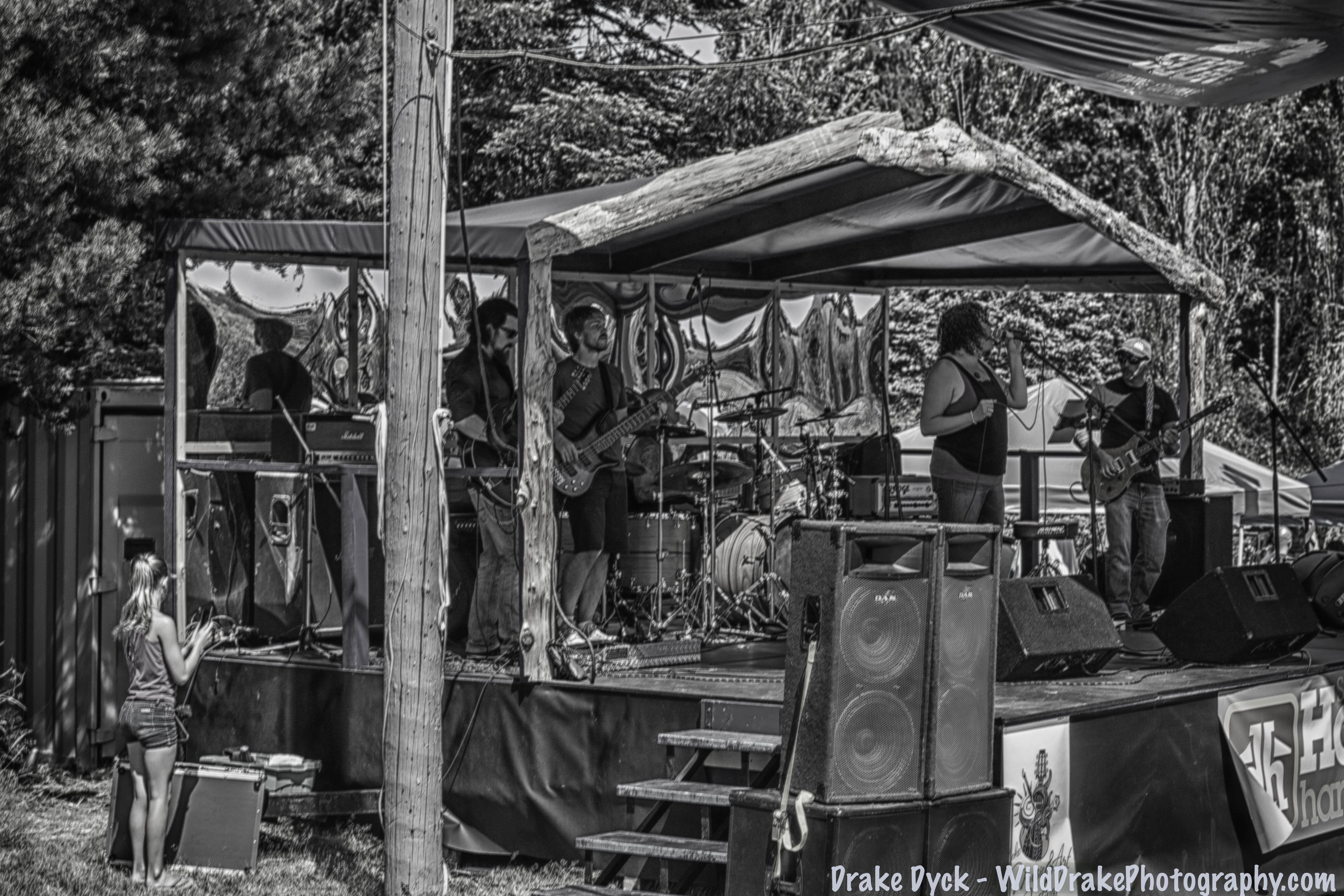 a band plays on a temporary stage