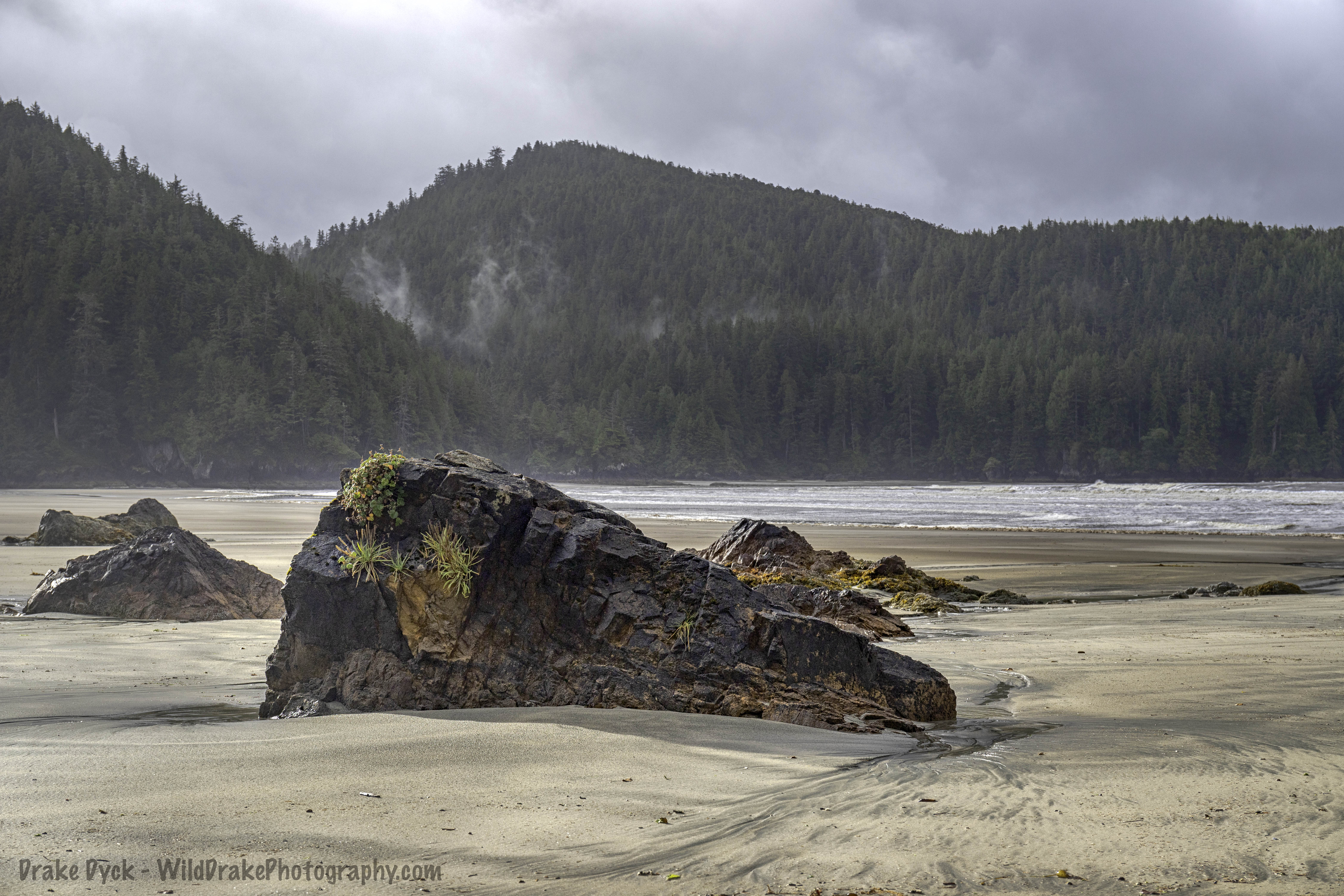 large rocks on the sandy beach at San Josef Bay
