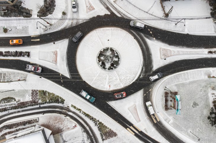 a traffic circle in the snow